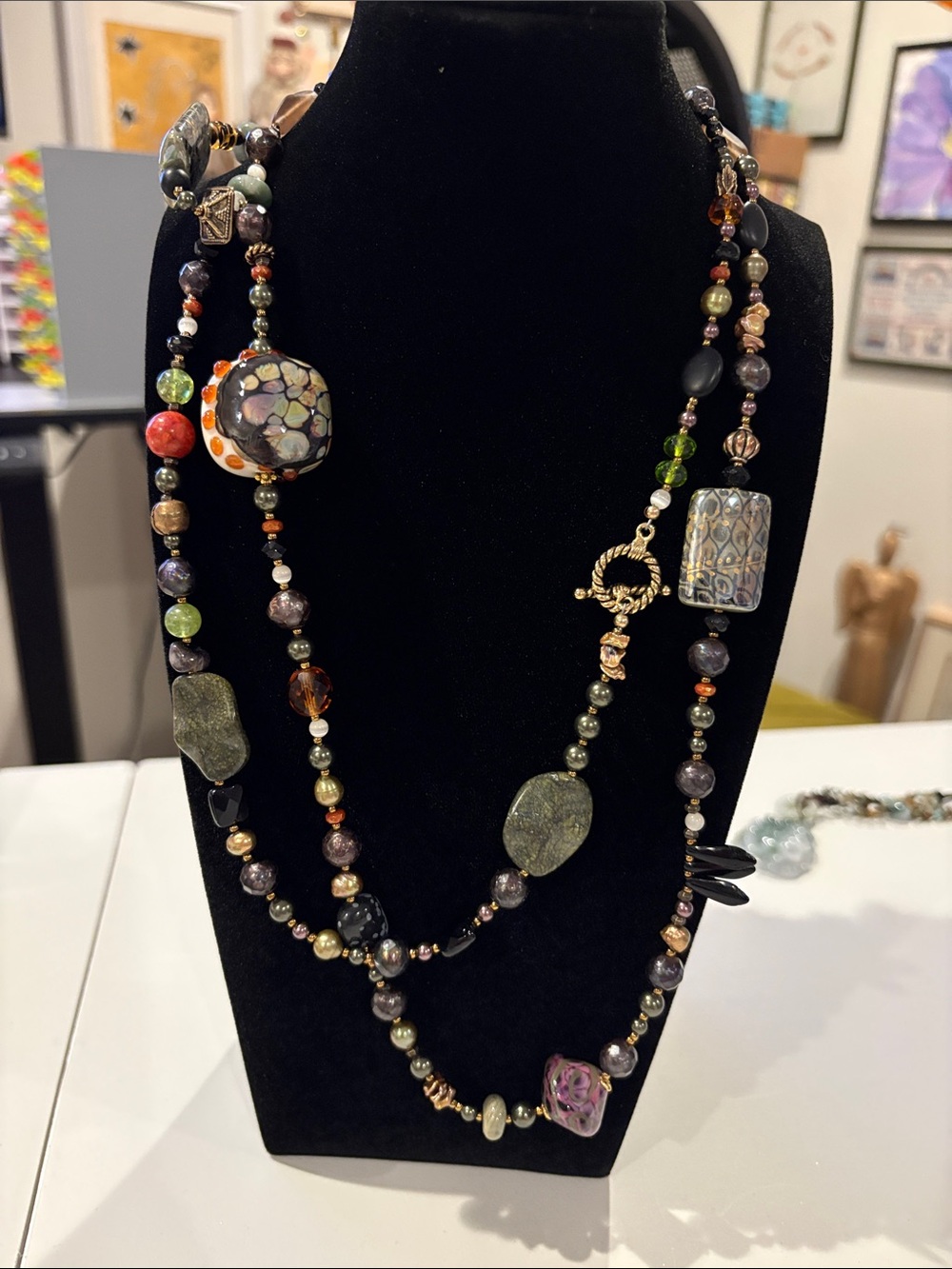 Multicolor Beaded Artisan Necklace with Green and Gold Accents